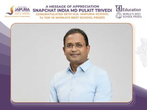 Portrait of a man in a light blue shirt against a gray backdrop, framed by purple decorative borders in a banner design.