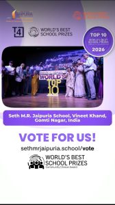 Stage photo from an award ceremony with a large 'TOP 10' sign, banners for Seth M.R. Jaipuria School and World's Best School Prizes, and a purple 'VOTE FOR US!' panel with the URL sethmrjaipuria.school/vote.