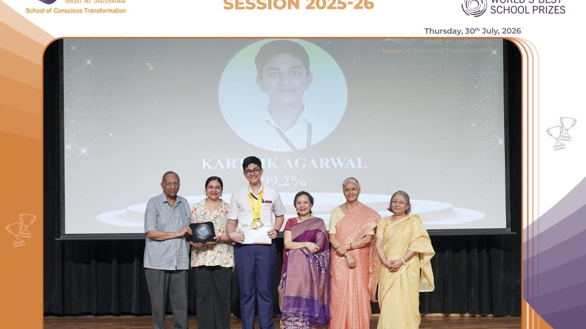 Group of students and seniors on a stage during an ICSE Felicitation ceremony, posing with medals and certificates.
