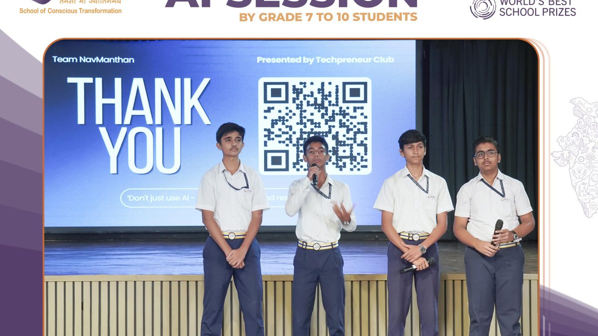 Five students in white shirts stand on stage presenting, with a large 'THANK YOU' screen and a QR code behind them.