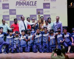 Bringing in the first prize in Football (Boys)