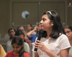Student asking a question to Krinali