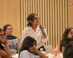 Student asking a question to Krinali