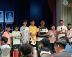Students singing a hymn together