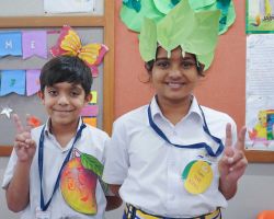 Rocking their vibrant headgear and mango signs
