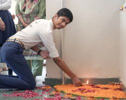 Ishan, our school head boy, lighting an earthen lamp